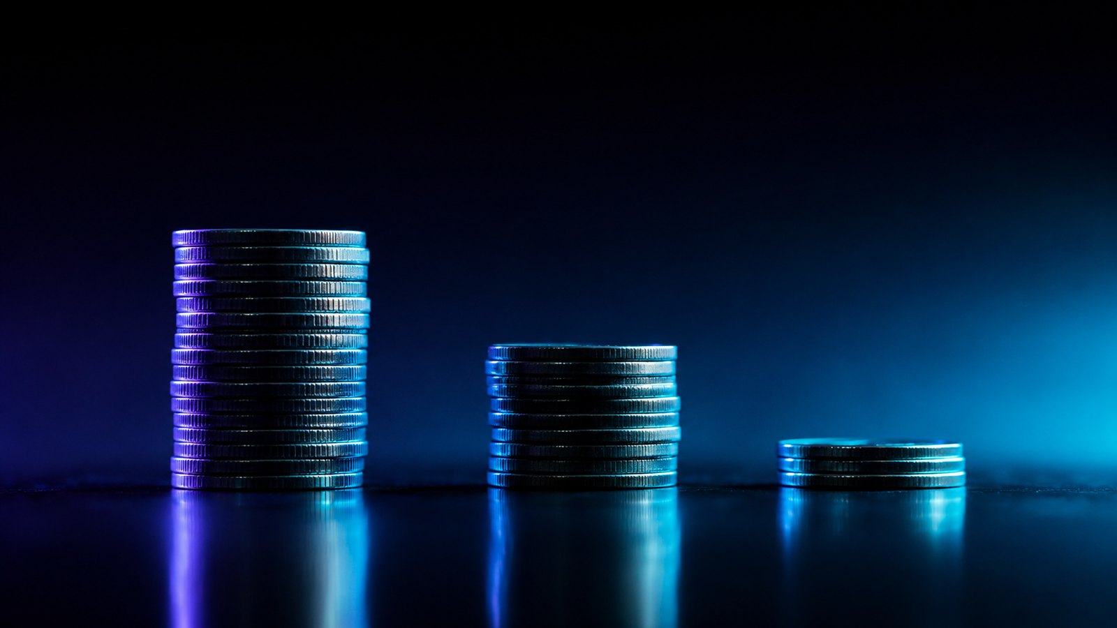 Three stacks of coins of very different heights comparing cable, stacked streaming apps and IPTV